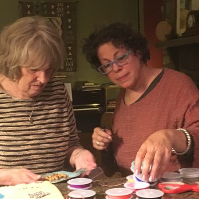 Stringing beads for prayer